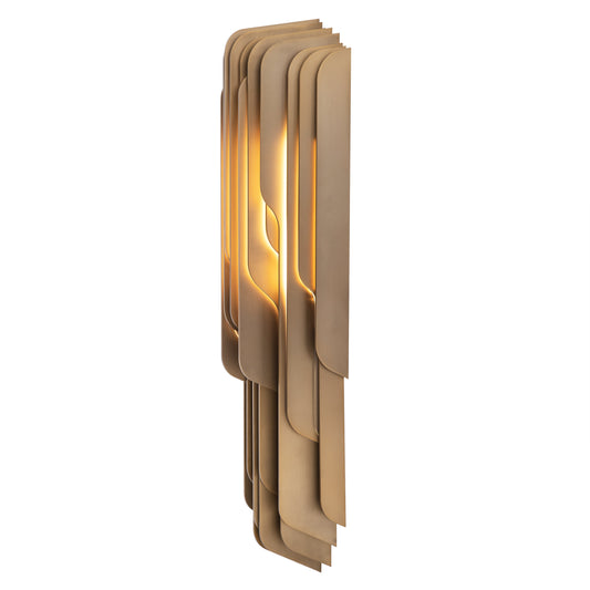 A sculptural metal sconce in the style of the Wesley Sconce by Atelier Purcell