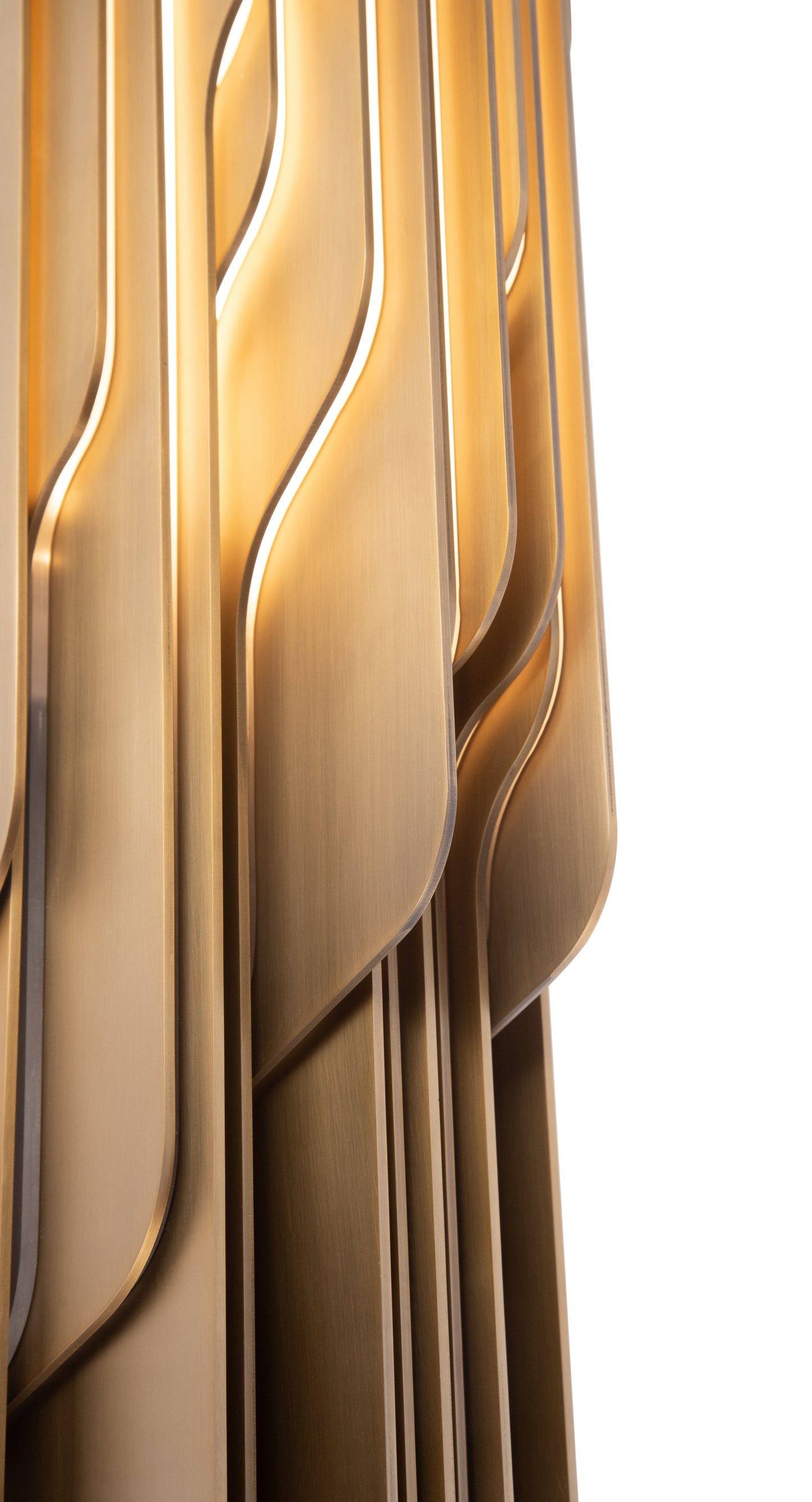 A sculptural metal sconce in the style of the Wesley Sconce by Atelier Purcell